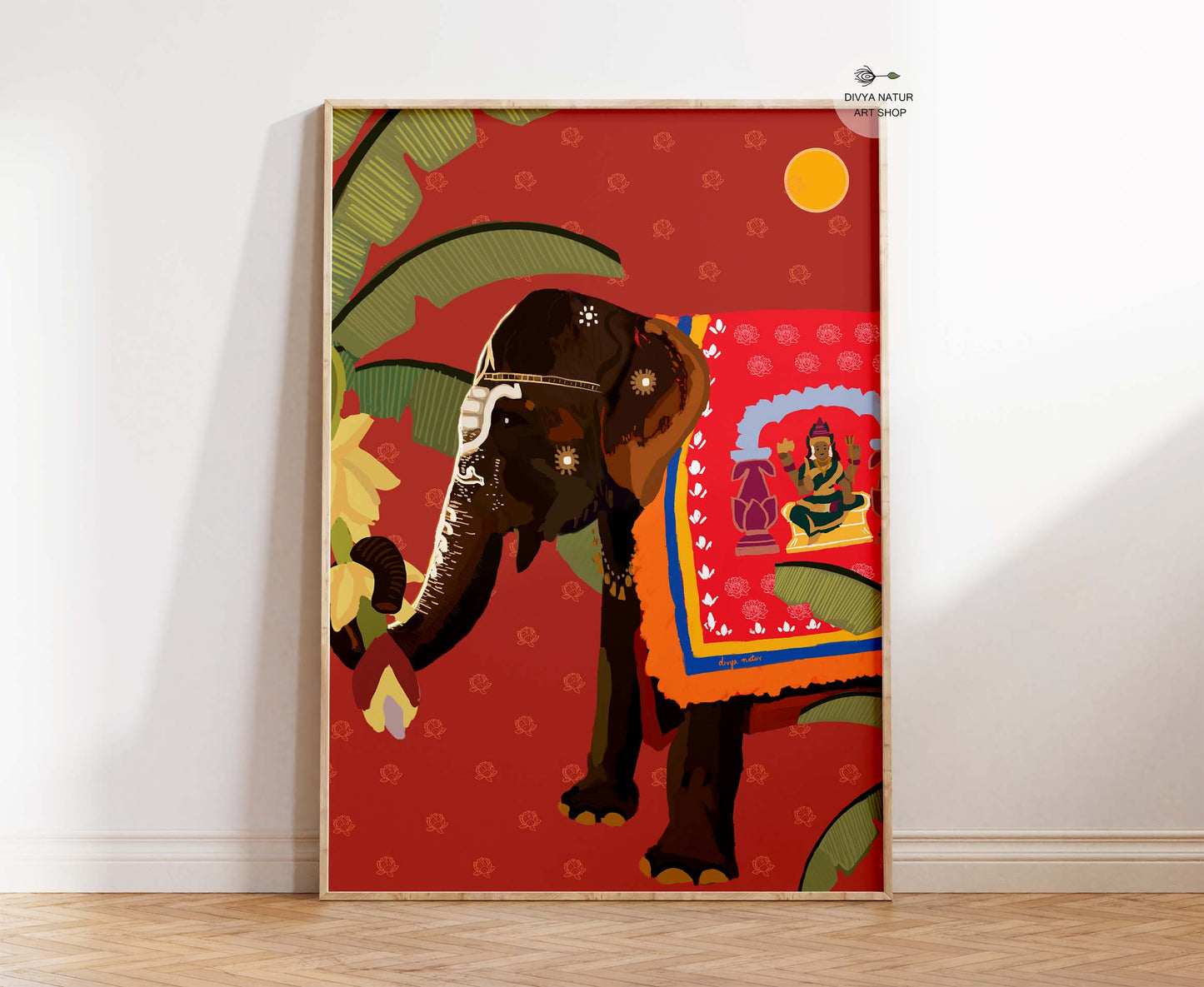 Premium fine art print of decorated Indian elephant with red background and banana leaves.