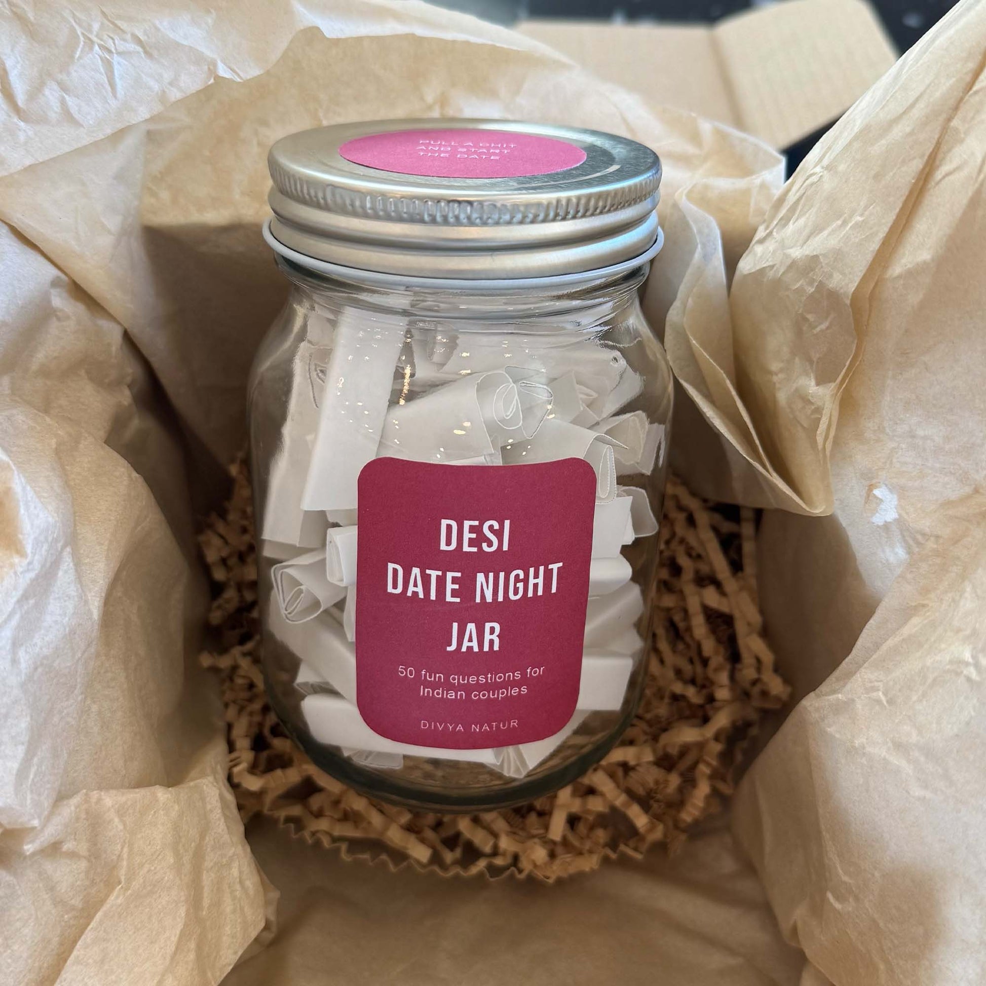 Couples conversation jar filled with playful questions for date night and relationship bonding