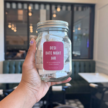 Date night conversation jar filled with playful questions for couples