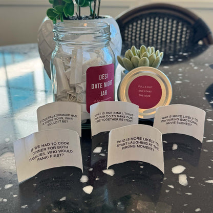 Glass date night jar with conversation prompts for couples to spark fun discussions