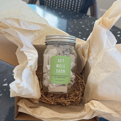 Glass affirmation jar with uplifting recovery messages designed to bring comfort