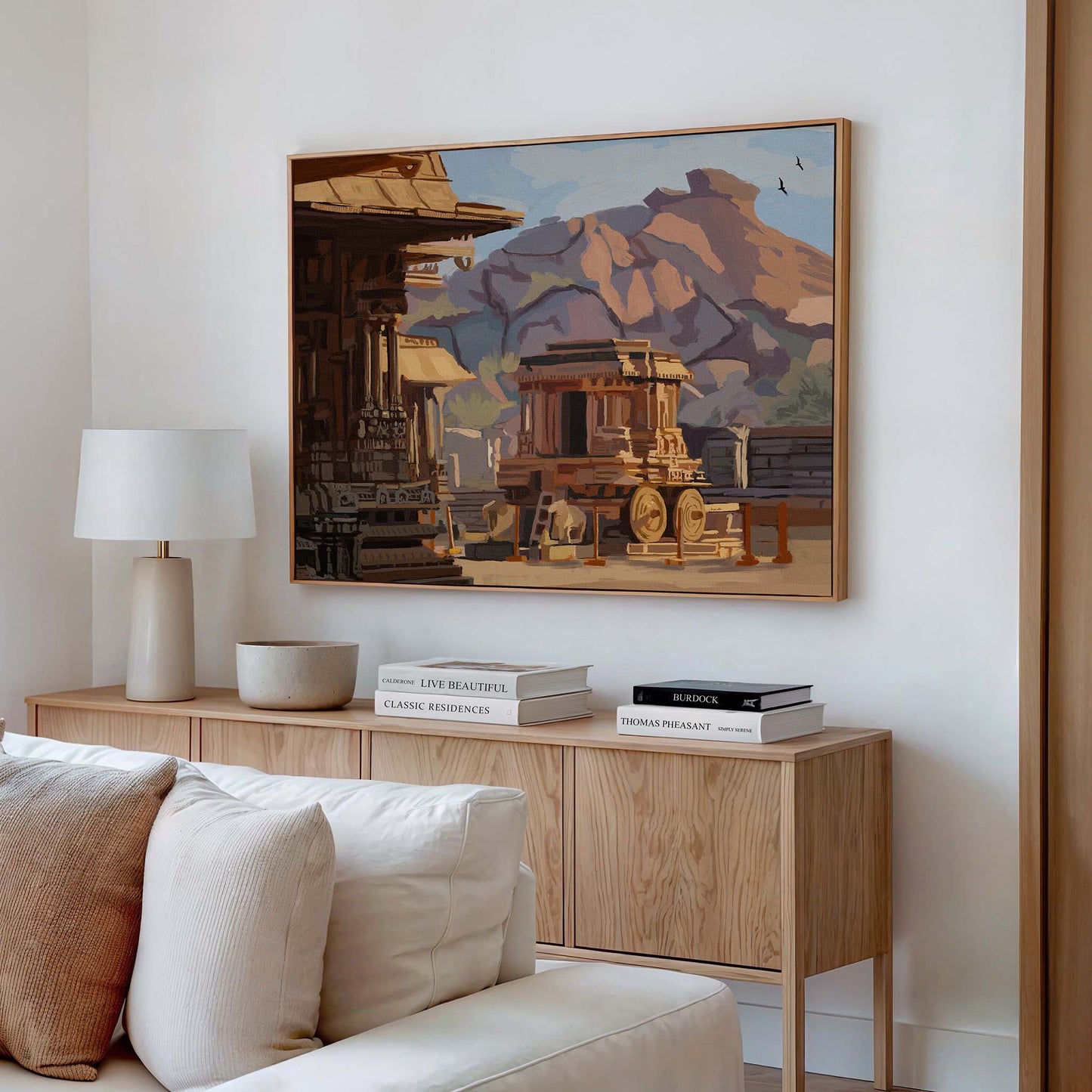 South Indian temple artwork with warm earthy tones and rocky mountain landscape backdrop
