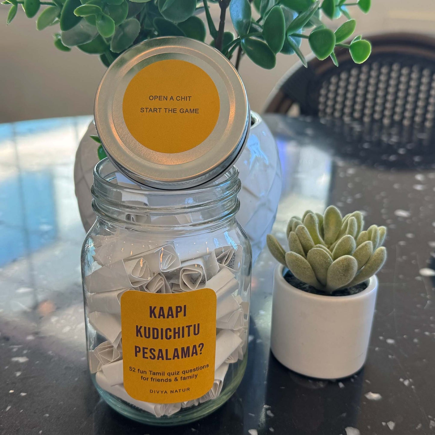 Tamil culture quiz jar with trivia questions about Tamil history traditions and cinema