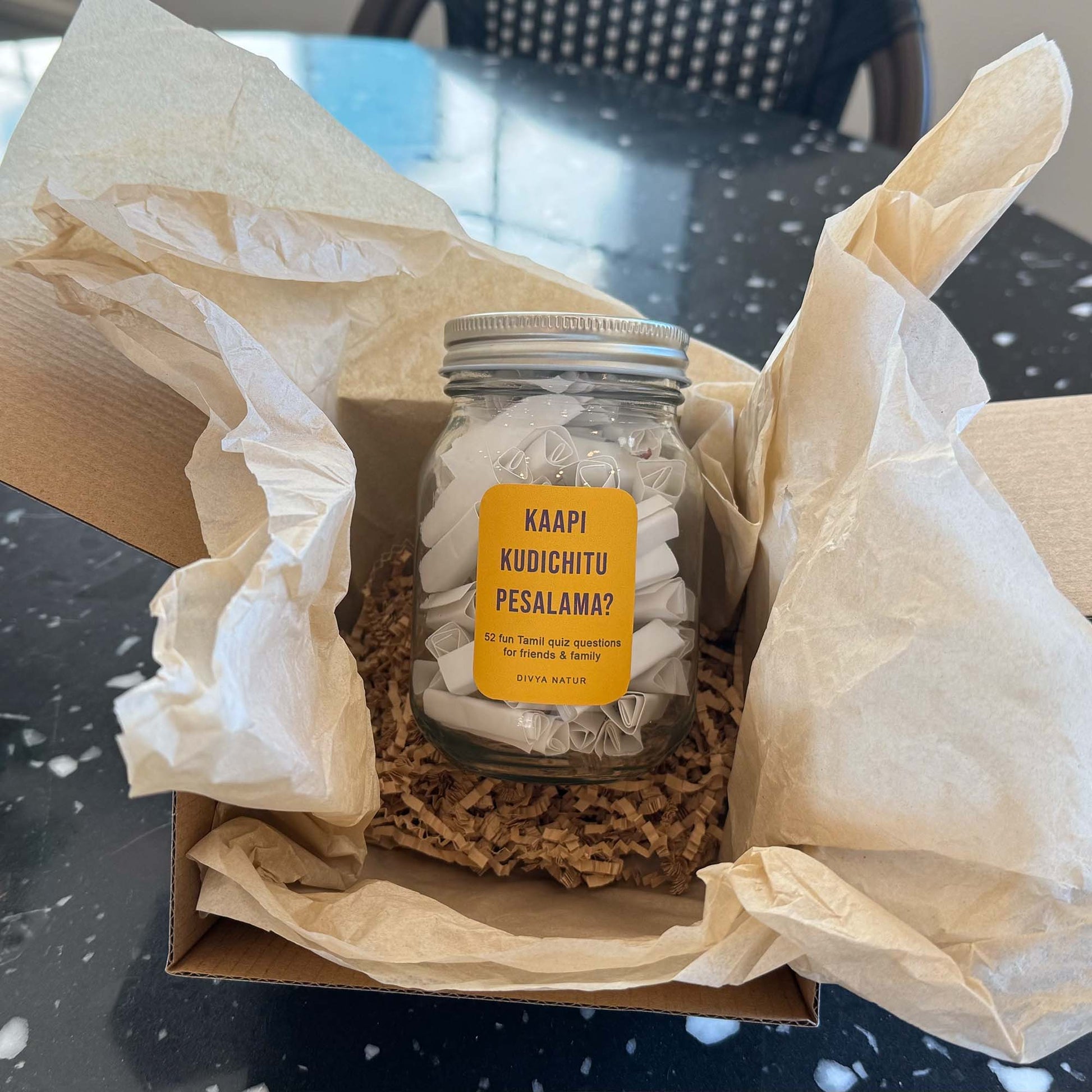 Tamil trivia jar game featuring cultural questions about Tamil literature and traditions