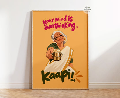 Funny South Indian filter coffee wall art featuring a smiling paati offering kaapi with Your Mind Is Overthinking Kaapi quote
