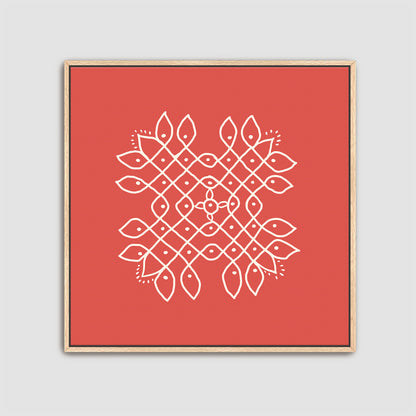 Framed artwork with a white kolam geometric pattern on a red background