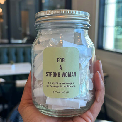 Strong woman affirmation jar filled with uplifting messages for confidence and encouragement