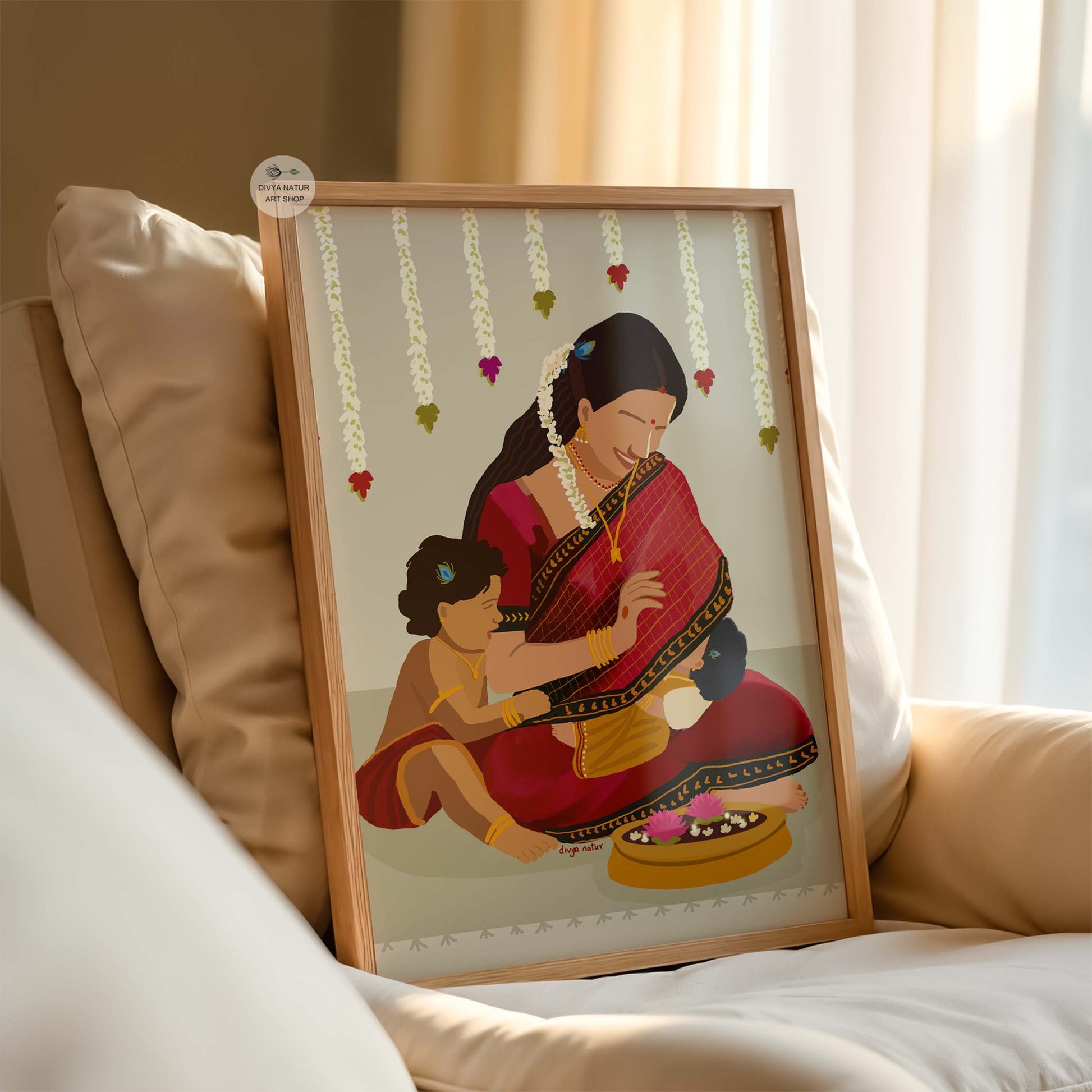 Cultural wall art of Amma sitting with her children and jasmine garlands