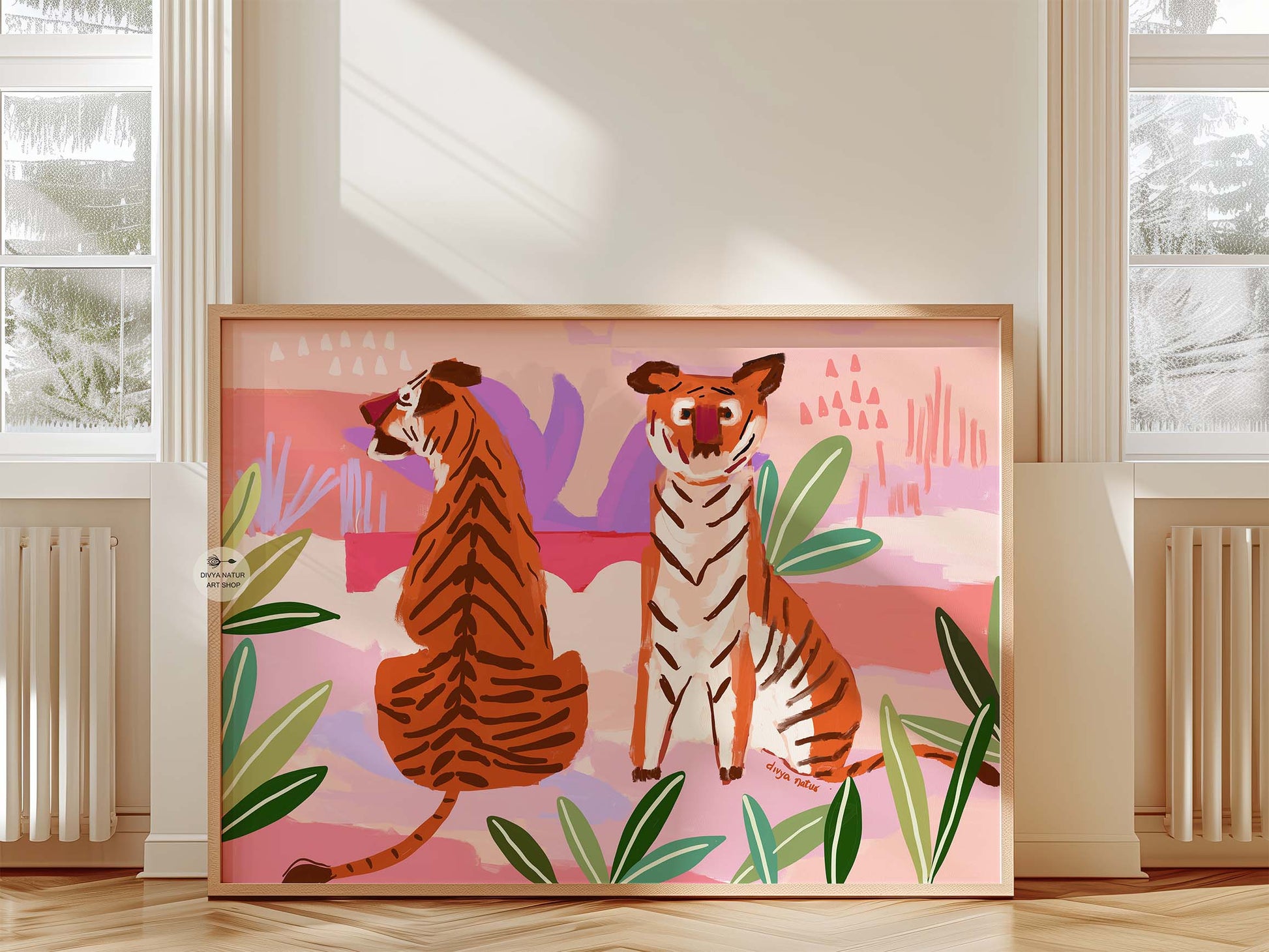 Modern wildlife artwork of tigers surrounded by abstract pink jungle foliage and soft lavender tones