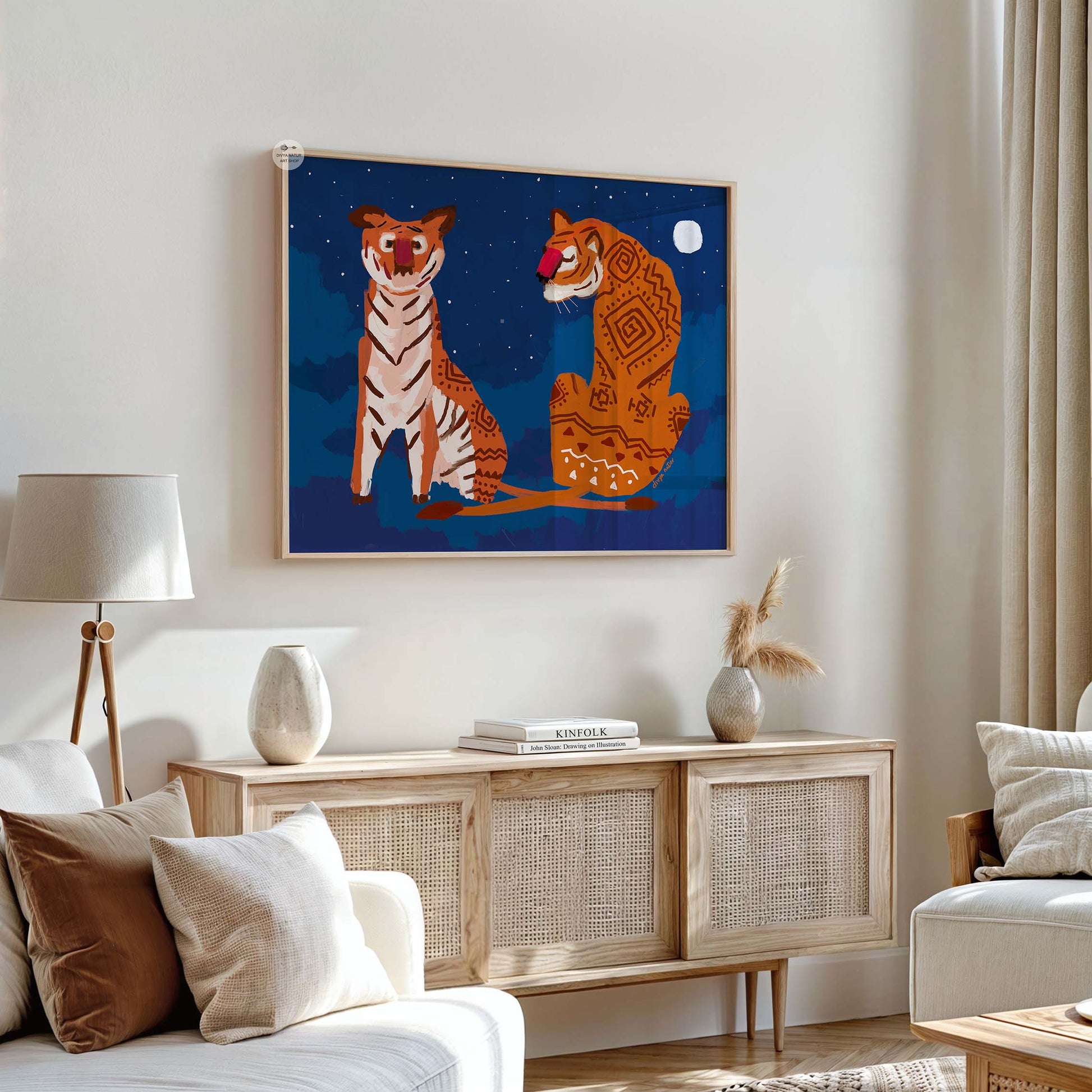 Bold wildlife wall art of tigers with symbolic patterns beneath a deep blue starry night sky