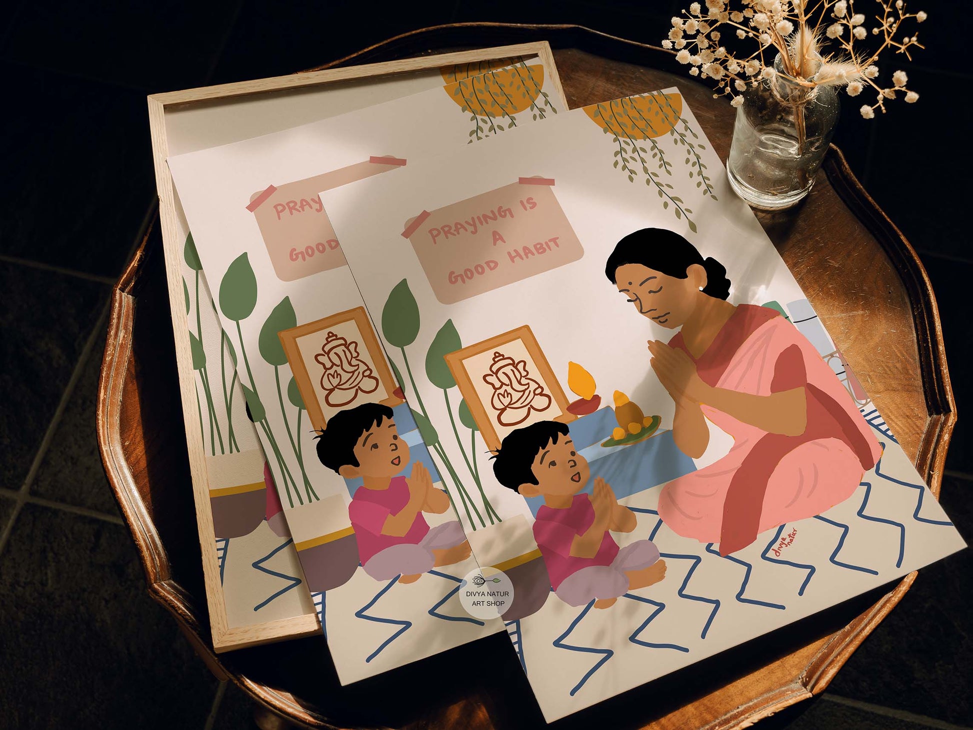 Indian family devotional wall art with mother and son praying together