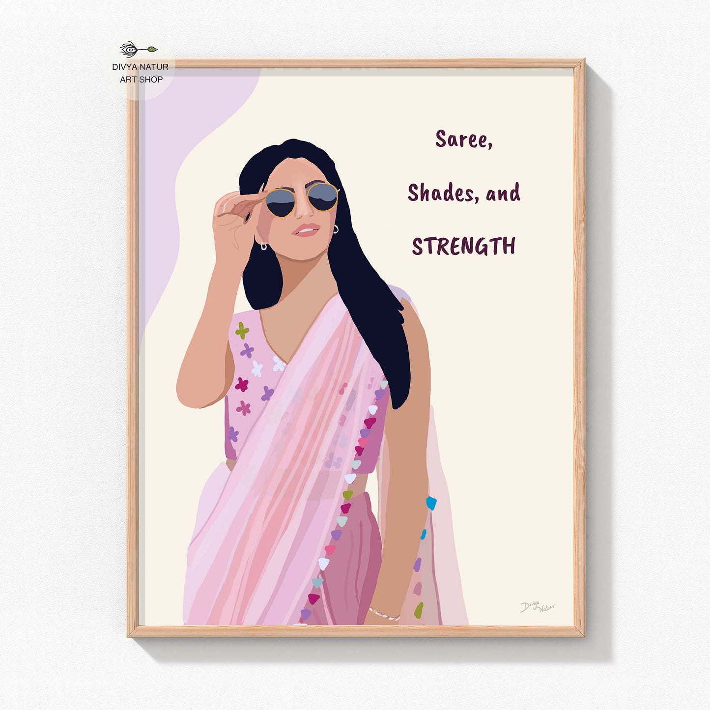 Vibrant and motivational art print of a confident woman in a pink saree.