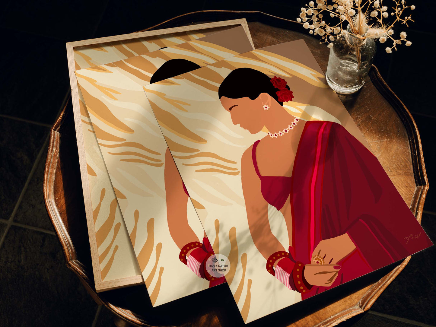Simple yet elegant art of a woman in a traditional red saree.