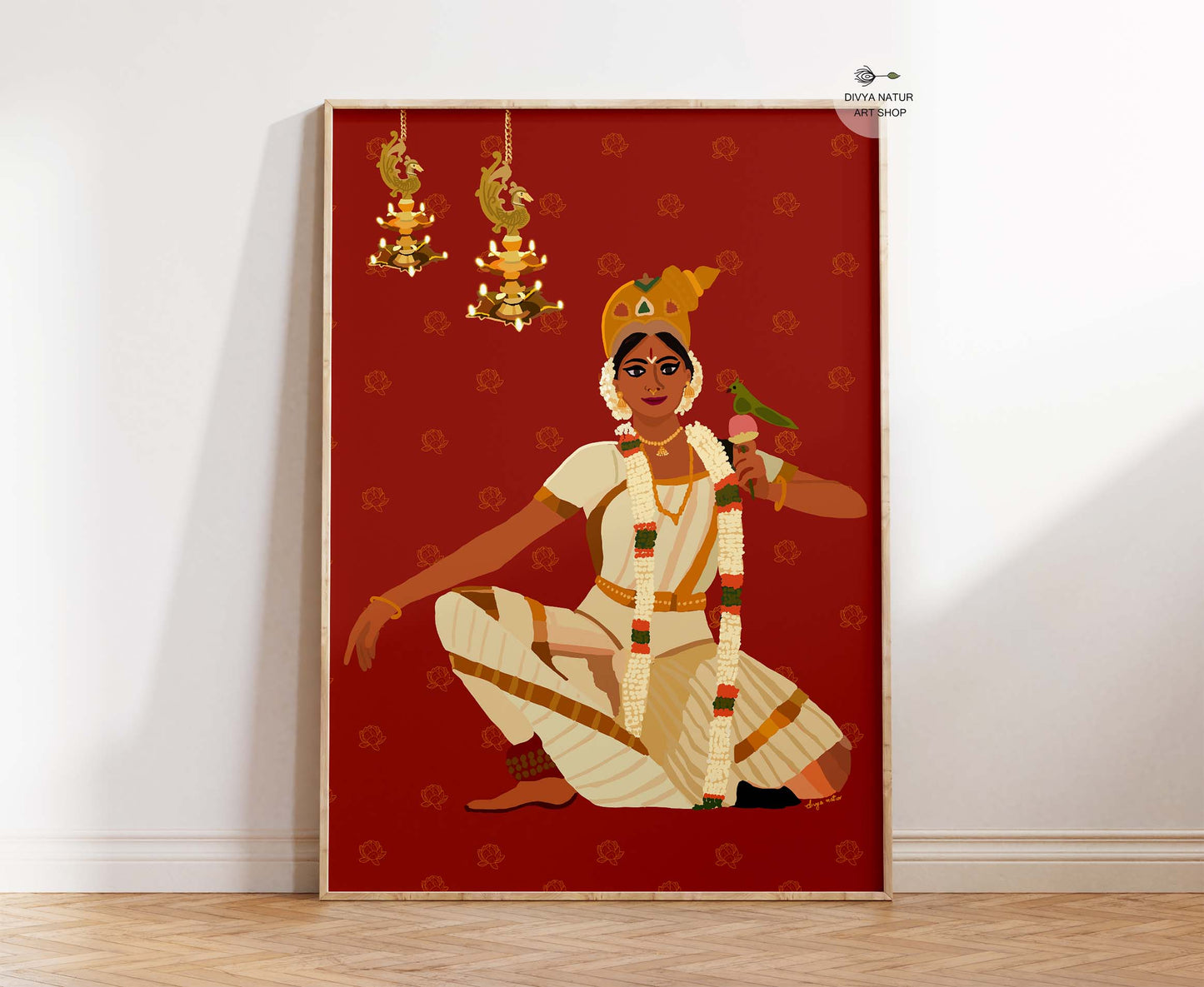 Hand illustrated Kerala classical dancer wall art set against a rich red temple inspired background with hanging oil lamps and jasmine garlands