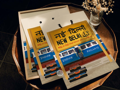 Nostalgic New Delhi Railway Station painting featuring suitcases and vibrant Indian trains.